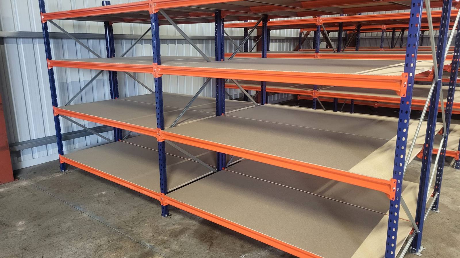 Long span shelving bays installed in a finished unit